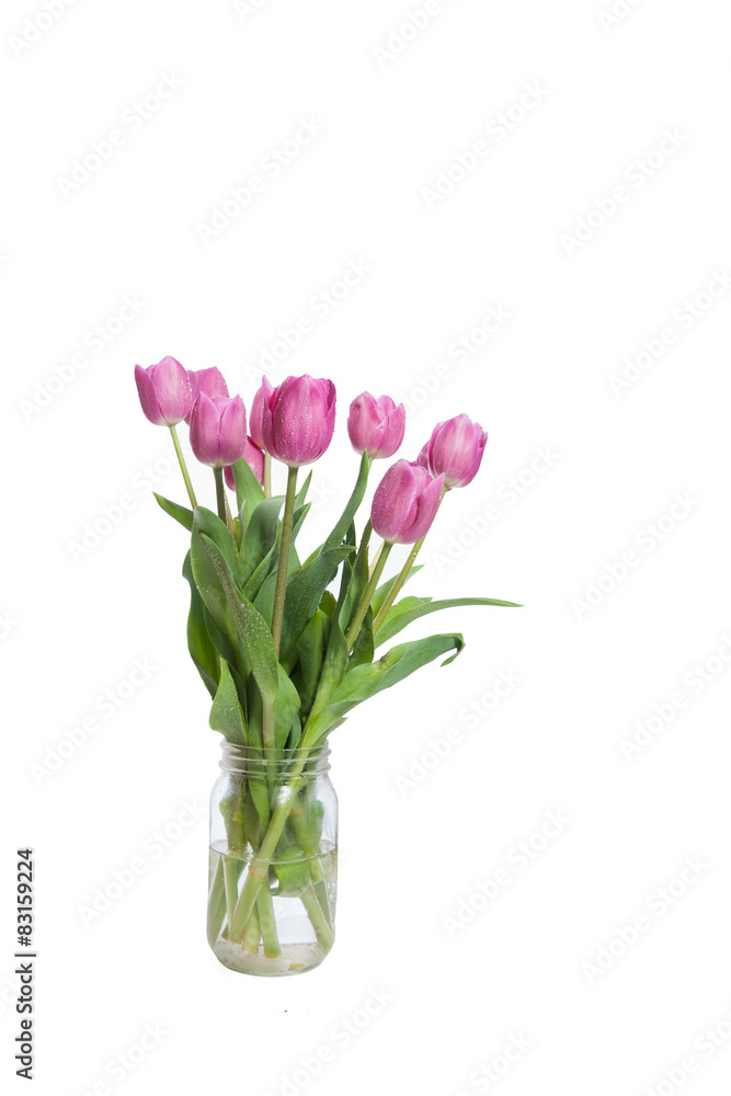 Jar full of pink tulips