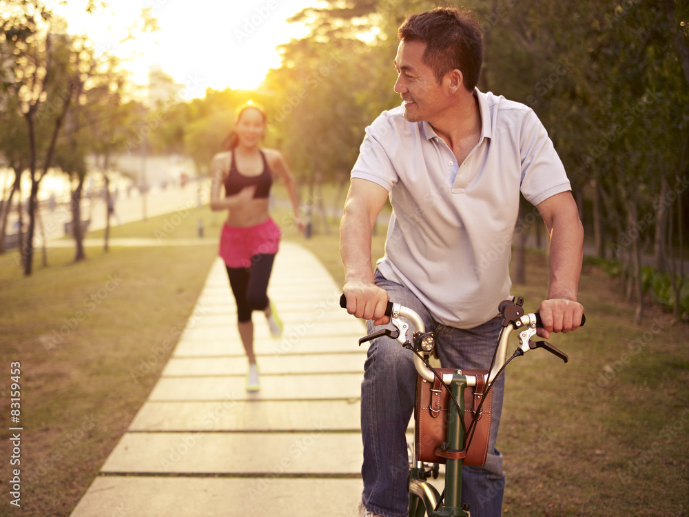 asian couple enjoying outdoor activities asian couple enjoying outdoor activities