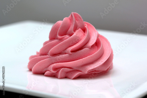 pink icing cream on white plate