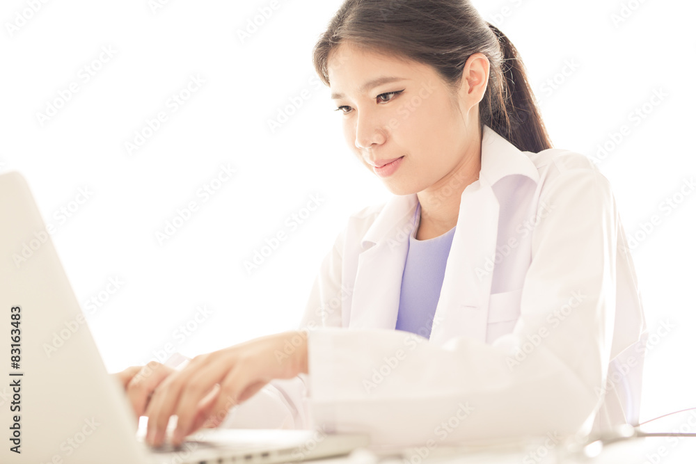Young and professional doctor working in office Young and professional doctor working in office