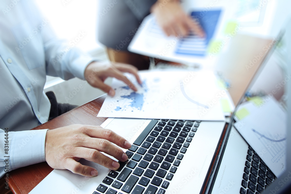 business documents on office table with smart phone and digital business documents on office table with smart phone and digital