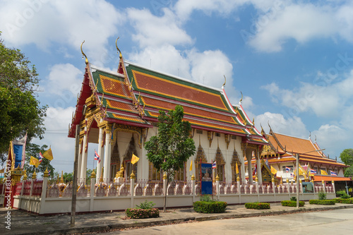 temple under sunlight with sky background at wat Khun sai