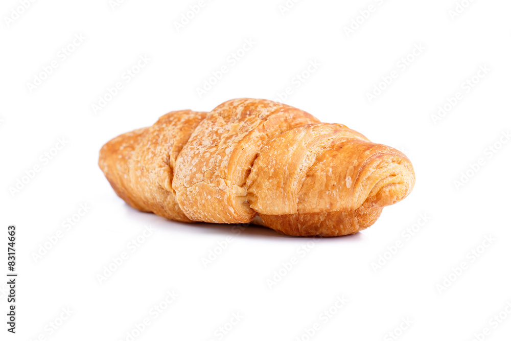 Tasty croissant on a white background.