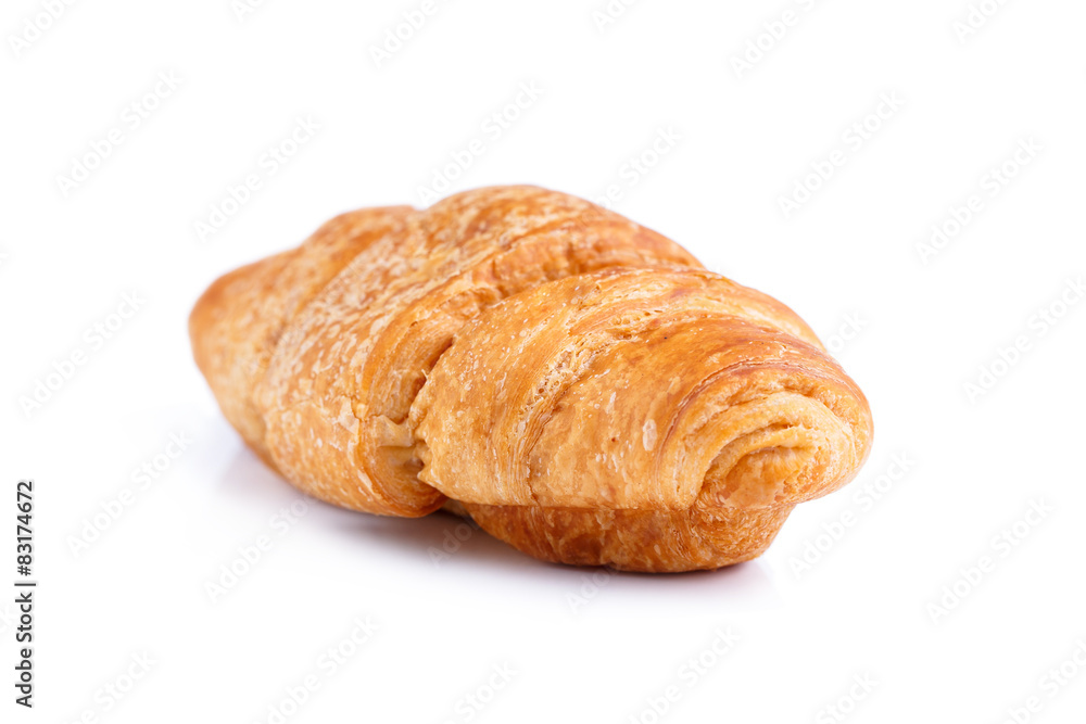 Tasty croissant on a white background.