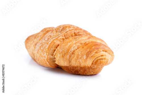 Tasty croissant on a white background.