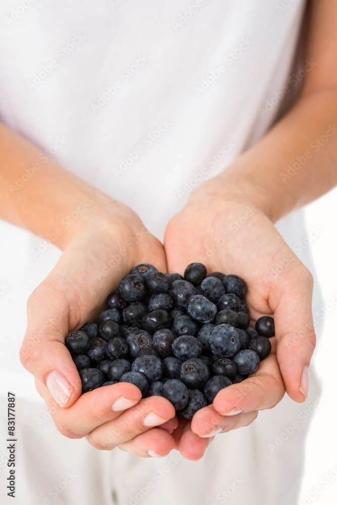 Woman holding blueberries Woman holding blueberries