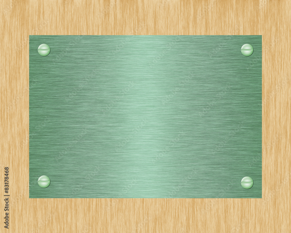 Obraz premium Green metal plate on board.