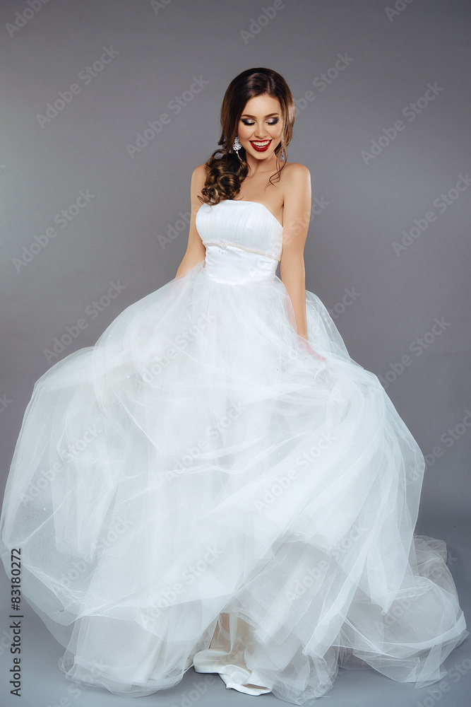 Portrait of a Beautiful Bride Model in a White Wedding Dress Portrait of a Beautiful Bride Model in a White Wedding Dress