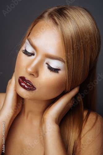 Portrait of a Beautiful Girl With Red Lips