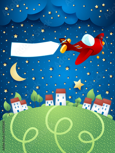 Night landscape with airplane, banner and village