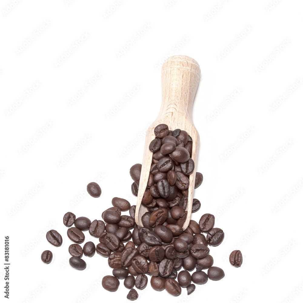 Obraz premium Coffee beans in wood spoon
