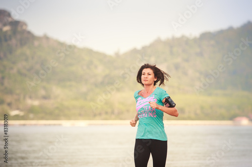 girl runs on beach at low tide