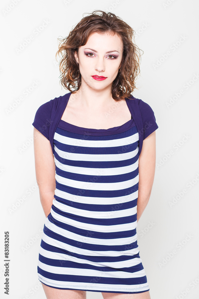 Girl in a striped dress