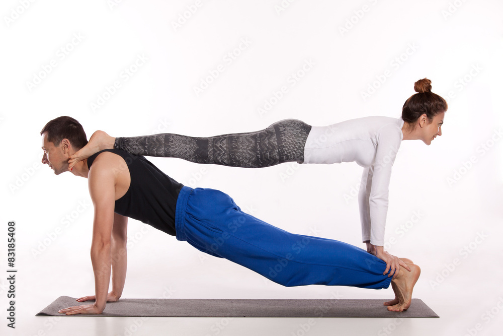 Obraz premium Yoga workout in couple