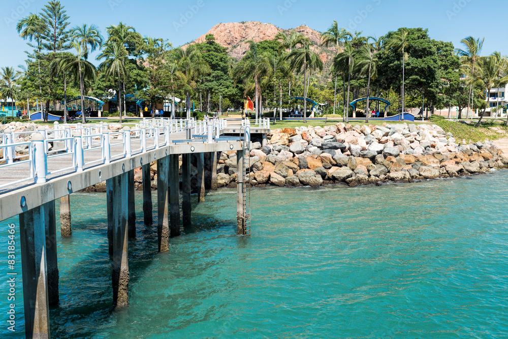 View from city pier on the tropical rocky coastline