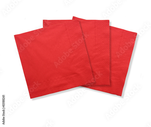 Three red paper napkins isolated over white background