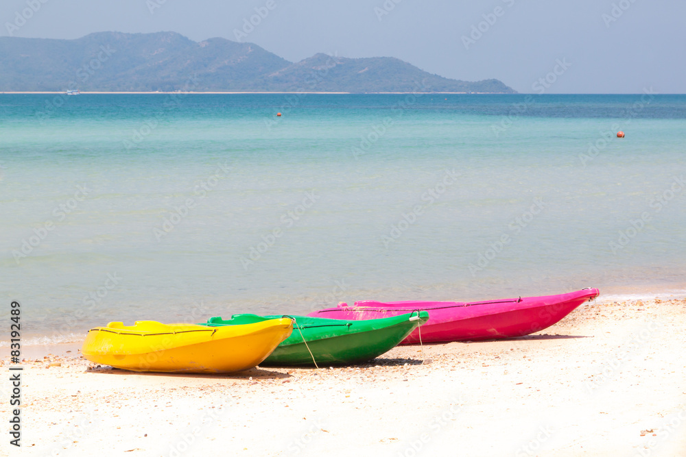 colorful kayak on beach