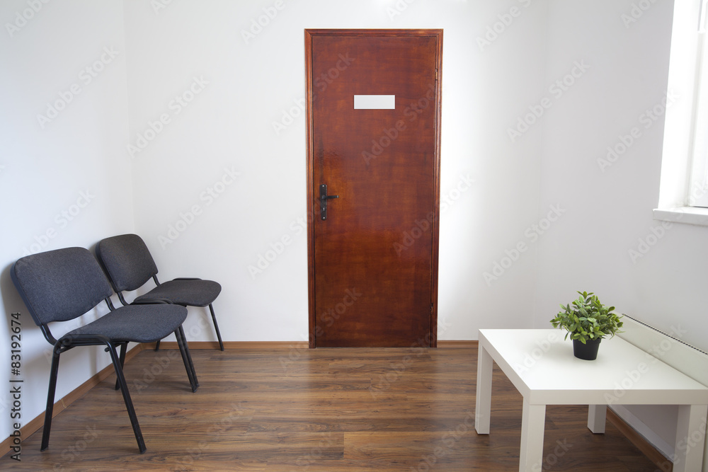Fototapeta premium Small Waiting Room with Closed Door