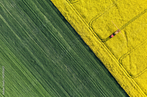 aerial view of harvest fields with tractor