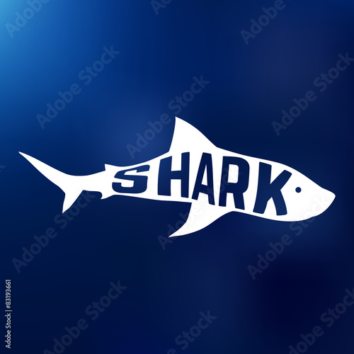 White shark silhouette with text inside. Logo concept