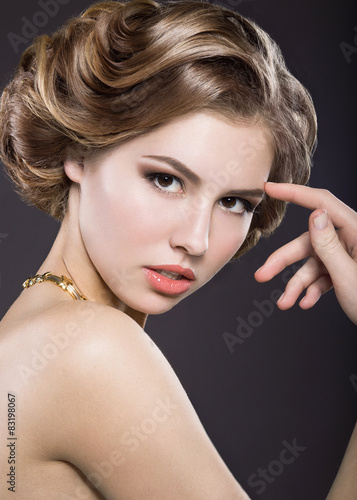 Photos Beautiful girl with evening hairstyle and bright makeup