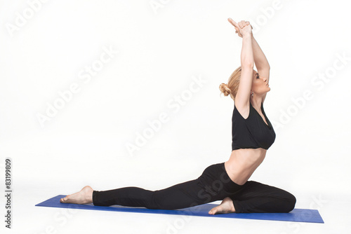Young woman doing yoga asana