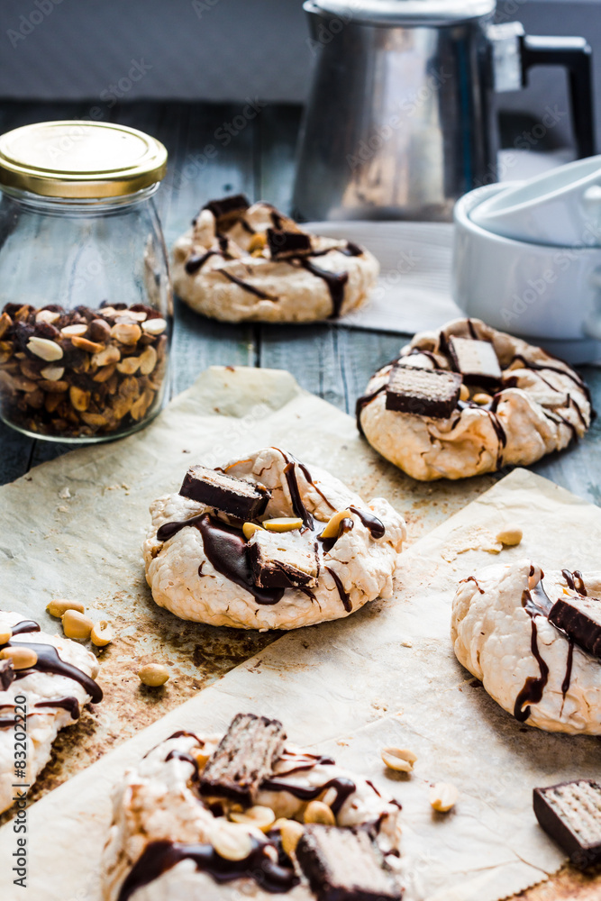 meringue with chocolate, caramel and nuts, sweet dessert meringue with chocolate, caramel and nuts, sweet dessert