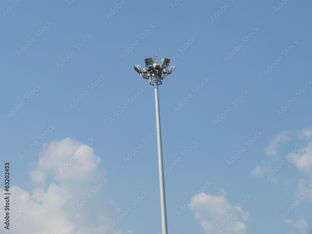Spotlight Tower on Clear Blue Sky Spotlight Tower on Clear Blue Sky