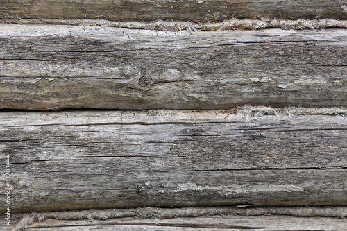 Texture of wooden boards with strips of fabric