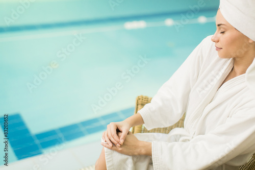 Young woman by the pool