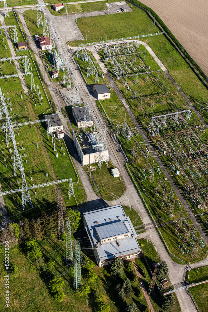 Aerial image of electrical substation featuring wires, transform Aerial image of electrical substation featuring wires, transform