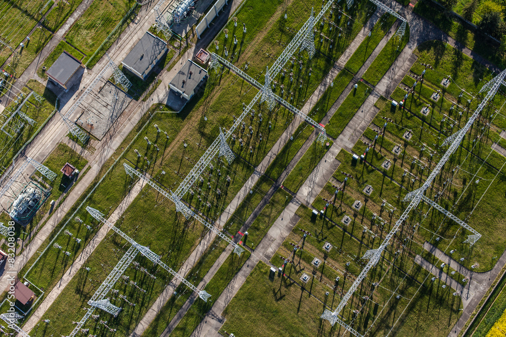 Aerial image of electrical substation featuring wires, transform