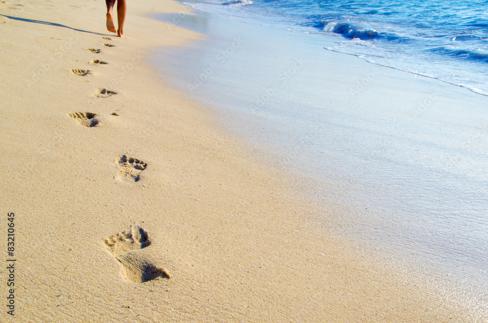 Fototapeta premium Footprints in beach