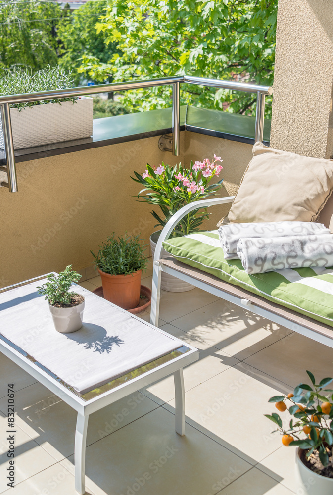 Relaxing on the balcony seat