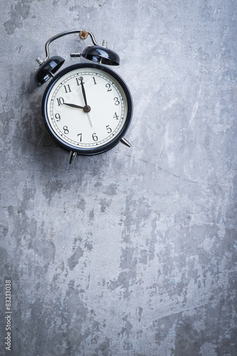 Wallpaper Mural Unusual picture of vintage alarm clock hanging on the wall Torontodigital.ca