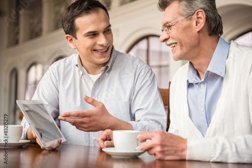 Businessmen in cafe