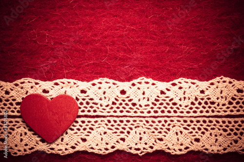 heart on red cloth background
