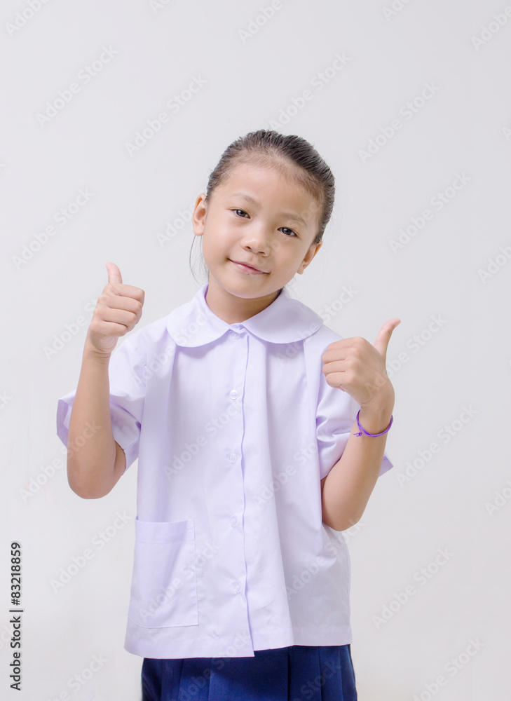 Asian kids cute girl in student's uniform on white background Asian kids cute girl in student's uniform on white background