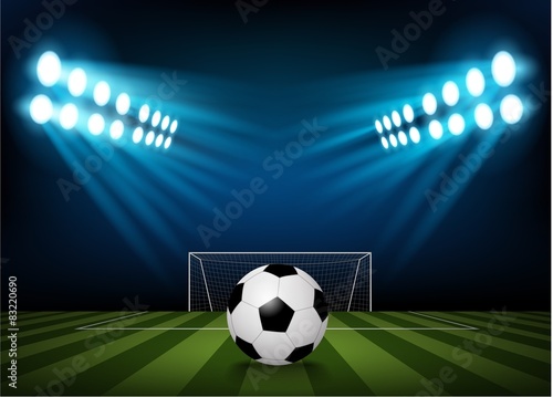 Football on the field of stadium with light