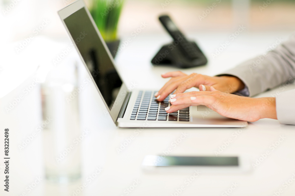 female hands working on laptop female hands working on laptop