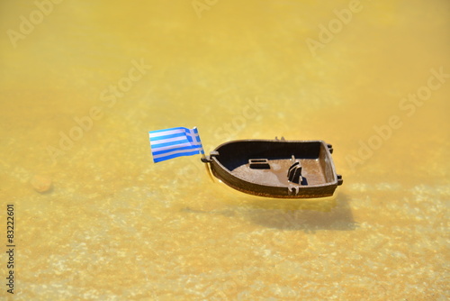 A boat with Greek Flag on it photo