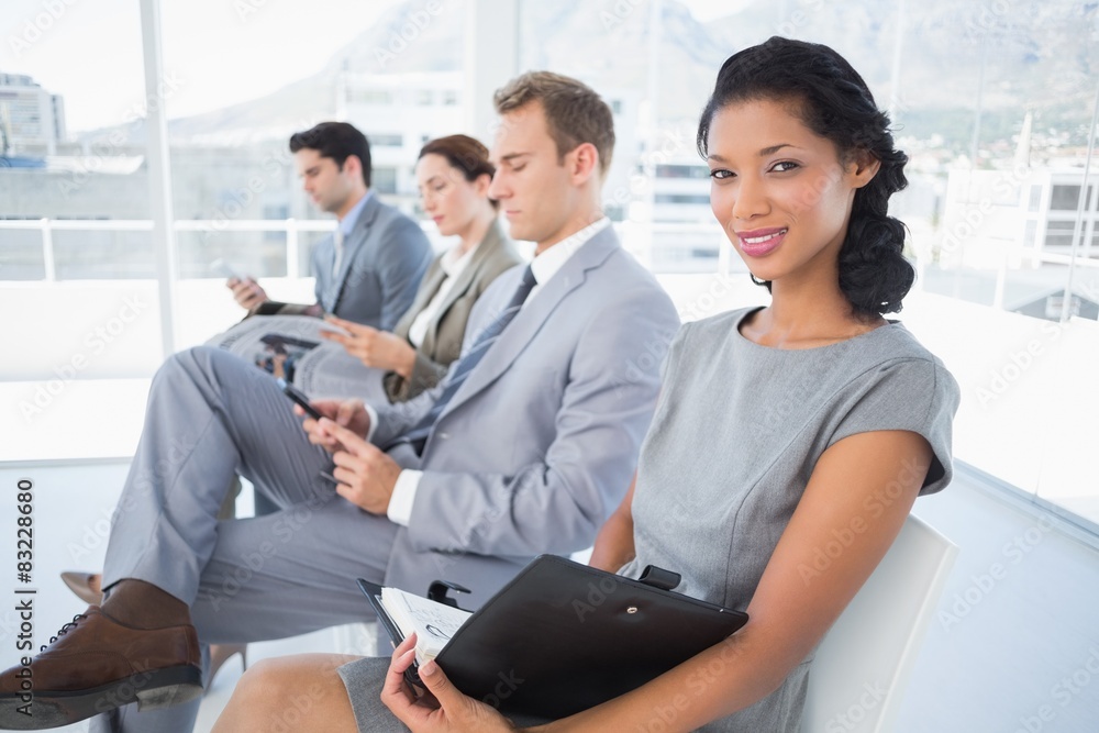 Business people sitting and waiting Business people sitting and waiting