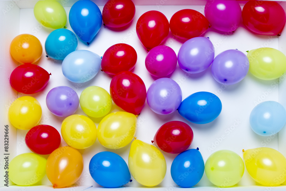 Colored baloons in the box Colored baloons in the box