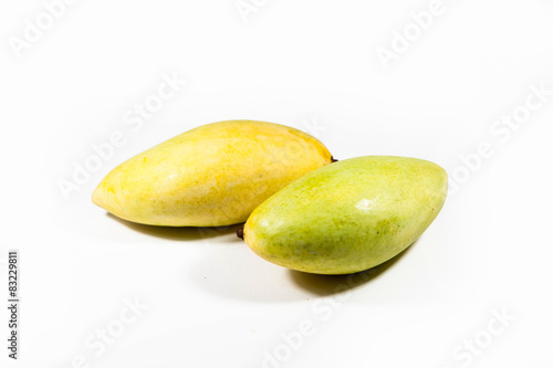 yellow mango on white background