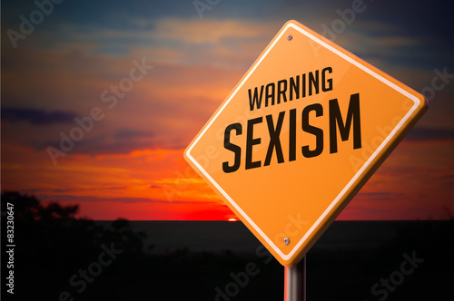Sexism on Warning Road Sign. photo