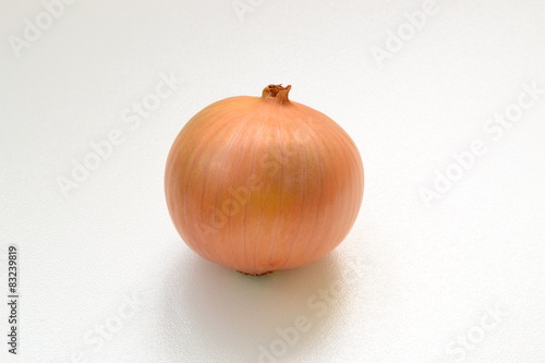 Onion on a white background on the table