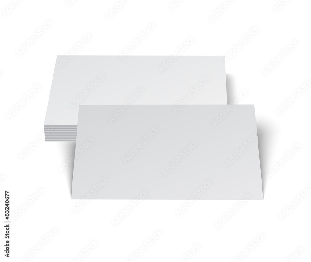 Stack of blank business card on white background with shadows.