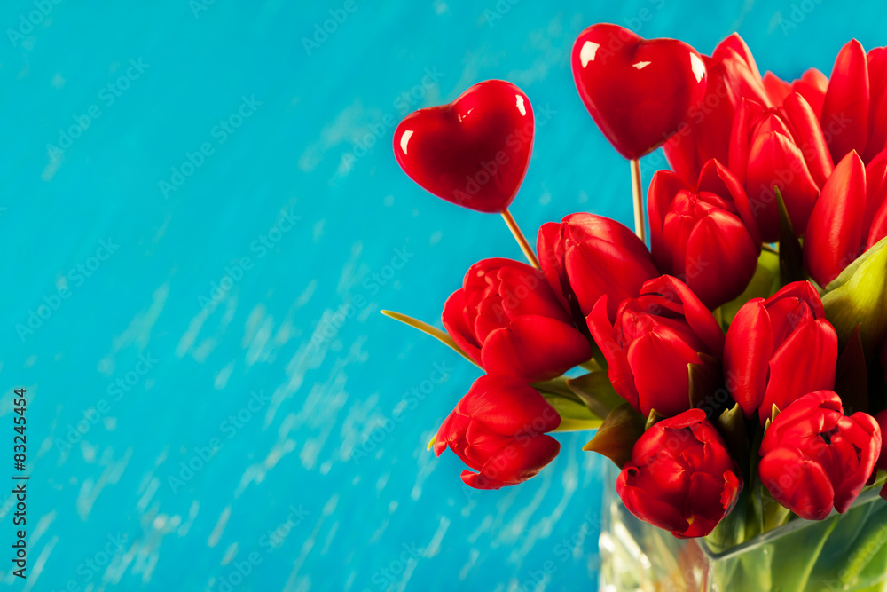 Valentine's day concept:  bunch of red tulips in vase
