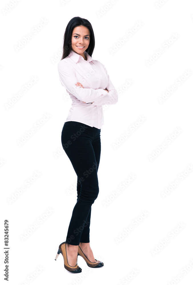 Smiling businesswoman standing with arms folded Smiling businesswoman standing with arms folded