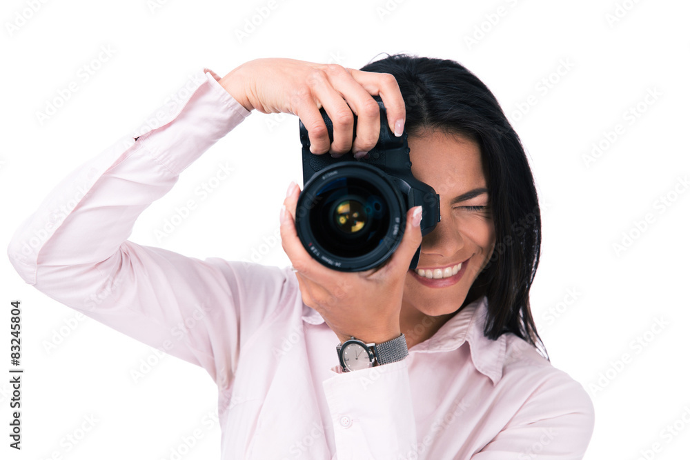 Young woman making photo on camera Young woman making photo on camera